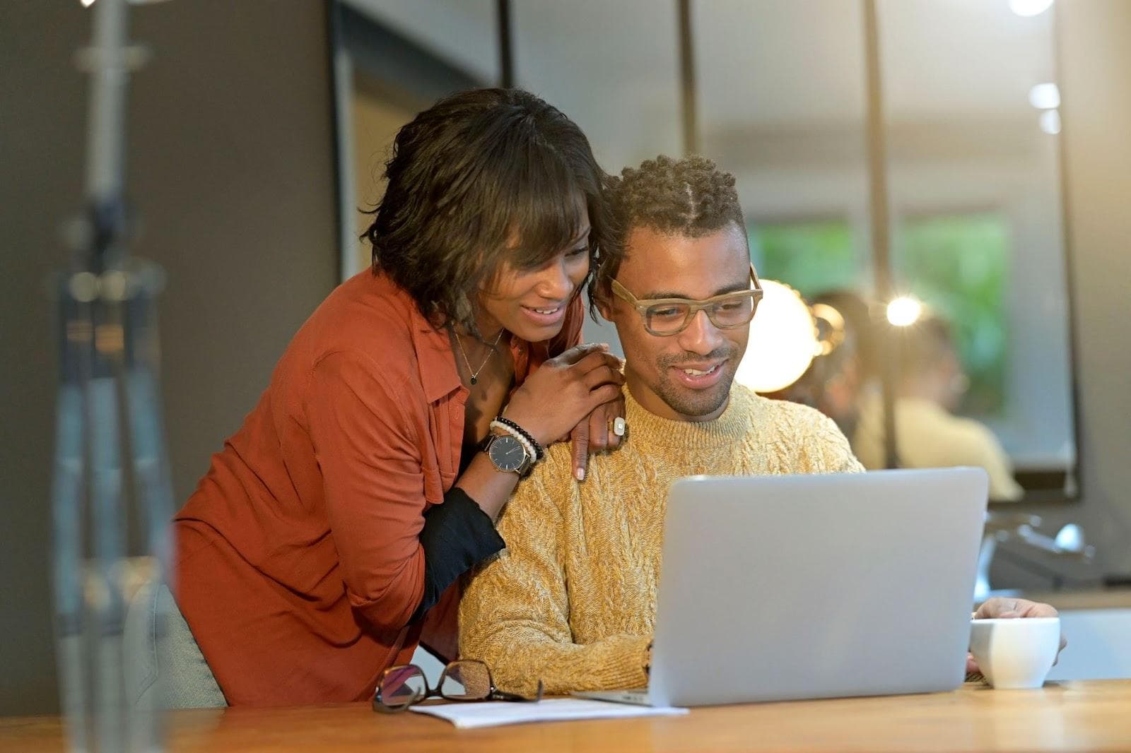 couple browsing for disability insurance on the laptop